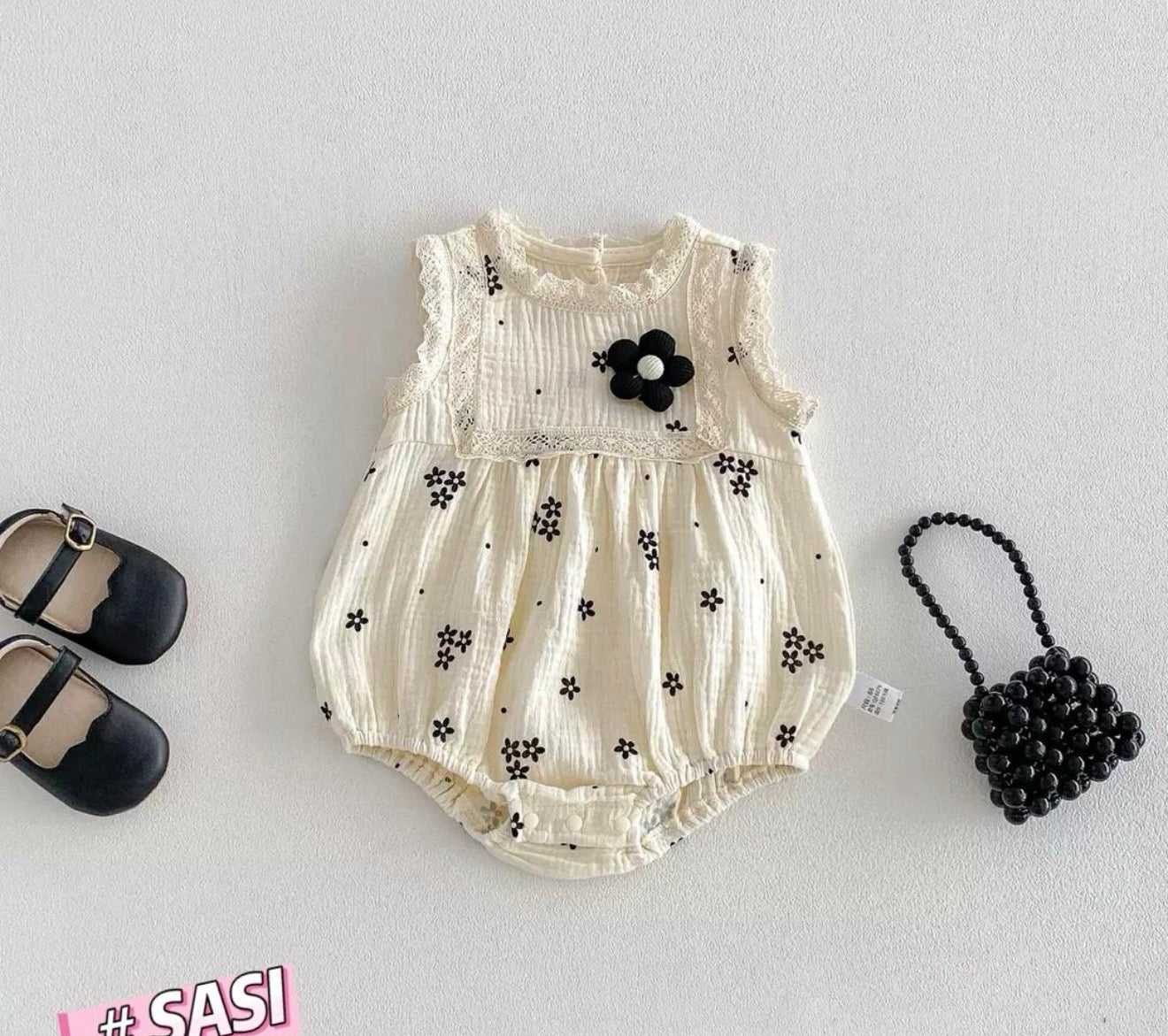 Black daisy romper