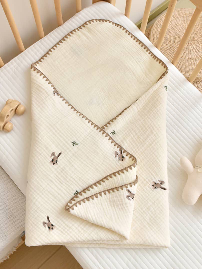 Embroidered muslin blankets