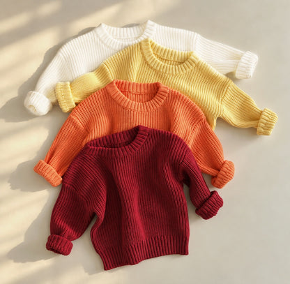 Baby knit sweaters- warm tones